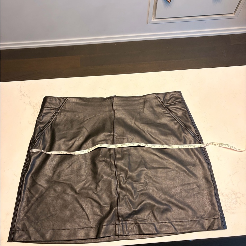 Black faux leather mini skirt